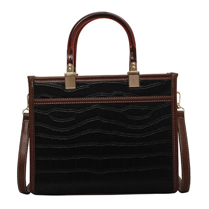 Dollcini Divatos Női Crossbody Táska – Elegáns és Praktikus Műbőr